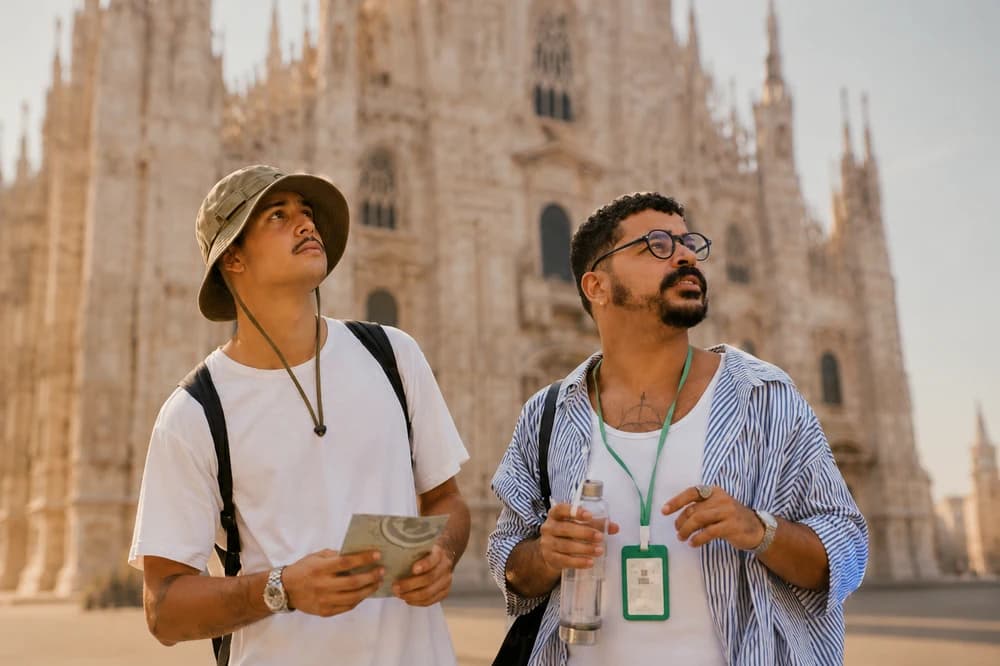 Tour guides in front of a historic cathedral